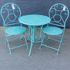 סט שולחן וכסאות ברזל בצבע טורקיז